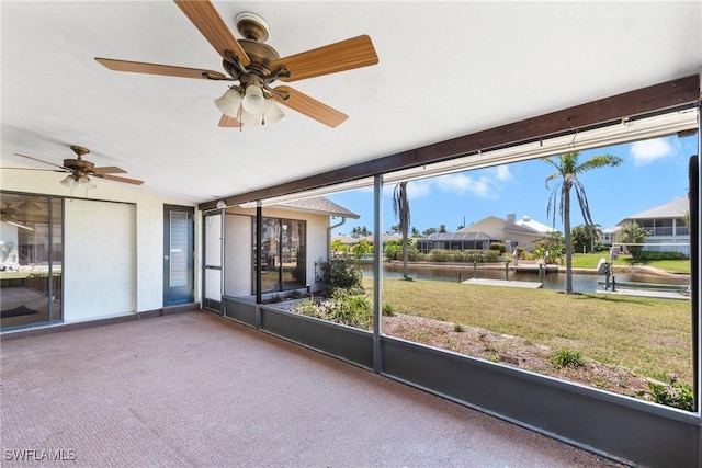 6181 Plumosa Ave, Fort Myers, FL 33908 - unfurnished sunroom with a water view and ceiling fan