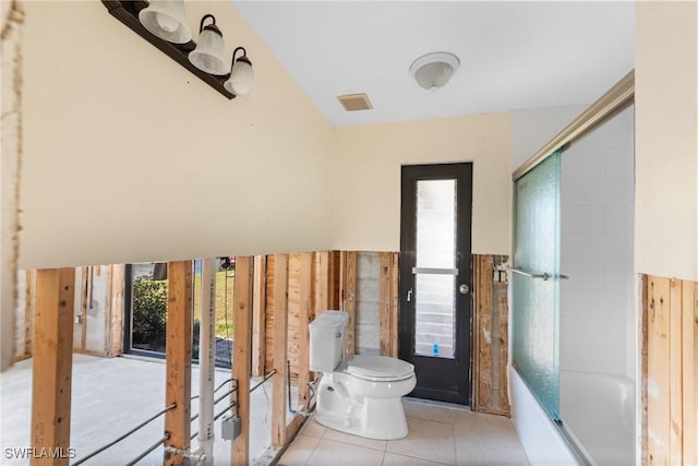6181 Plumosa Ave, Fort Myers, FL 33908 - bathroom with toilet, tile patterned floors, enclosed tub / shower combo, and visible vents