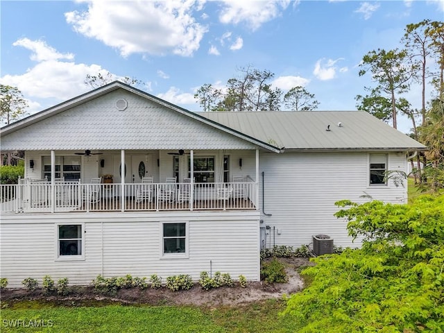 2920 24th Ave SE, Naples, FL 34117 - rear view of property with a ceiling fan, cooling unit, and metal roof