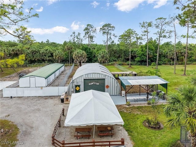 2920 24th Ave SE, Naples, FL 34117 - view of pole building featuring a yard