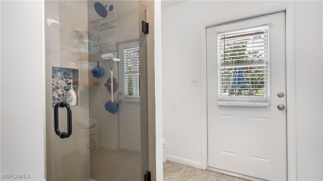 2920 24th Ave SE, Naples, FL 34117 - full bath featuring baseboards, tile patterned flooring, and a stall shower