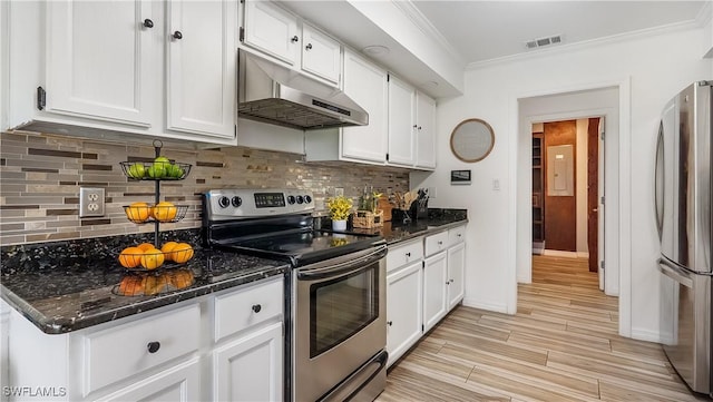 2920 24th Ave SE, Naples, FL 34117 - kitchen with white cabinets, stainless steel appliances, under cabinet range hood, and ornamental molding