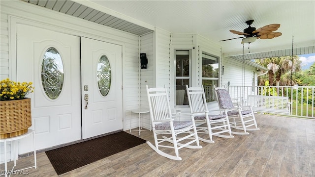 2920 24th Ave SE, Naples, FL 34117 - property entrance featuring ceiling fan and covered porch