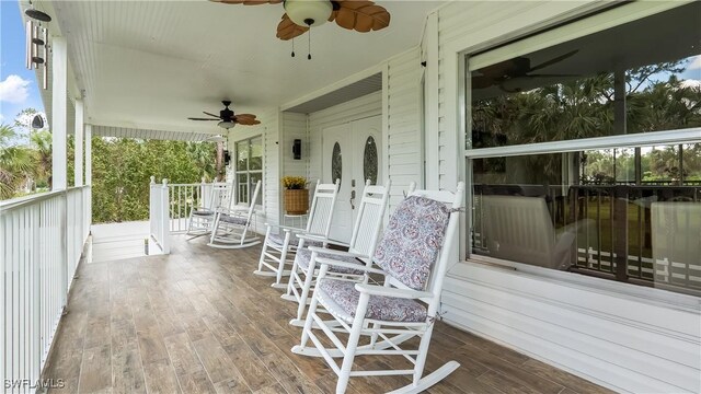 2920 24th Ave SE, Naples, FL 34117 - deck with a ceiling fan and a porch