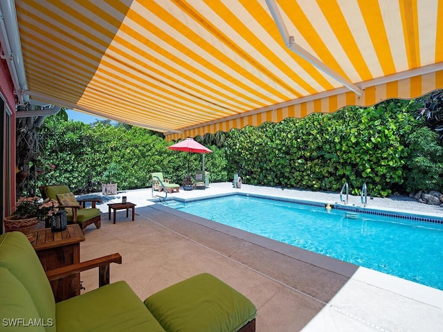 1055 8th Ave N, Naples, FL 34102 - outdoor pool with a patio
