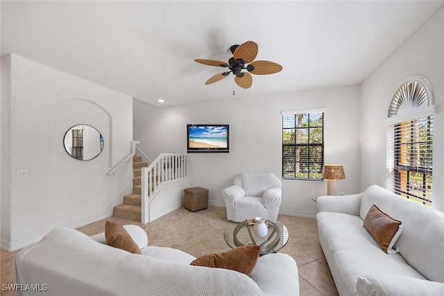 9134 Chula Vista St Unit 125, Naples, FL 34113 - living area featuring light tile patterned floors, a ceiling fan, recessed lighting, stairs, and baseboards