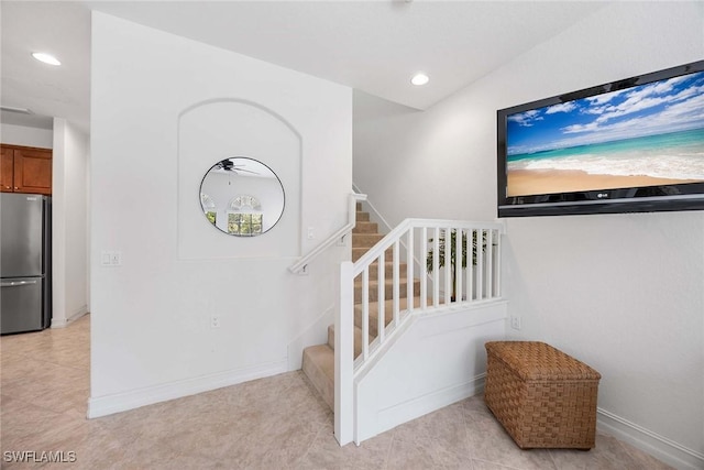 9134 Chula Vista St Unit 125, Naples, FL 34113 - staircase with tile patterned floors, baseboards, and recessed lighting