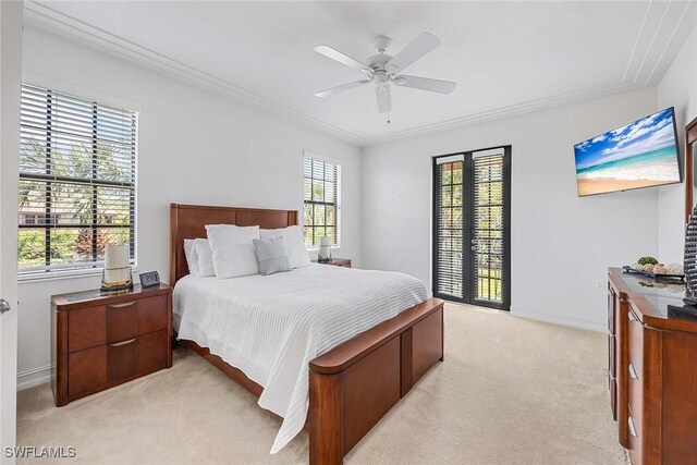 9134 Chula Vista St Unit 125, Naples, FL 34113 - bedroom with crown molding, ceiling fan, light colored carpet, and baseboards