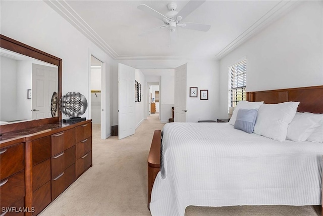 9134 Chula Vista St Unit 125, Naples, FL 34113 - bedroom featuring light carpet and ceiling fan