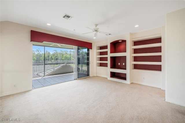 5072 Kensington High St, Naples, FL 34105 - unfurnished living room with visible vents, a ceiling fan, baseboards, carpet flooring, and built in shelves