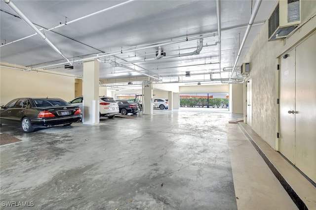 3100 Gulf Shore Blvd N Unit 103, Naples, FL 34103 - parking garage featuring a garage door opener