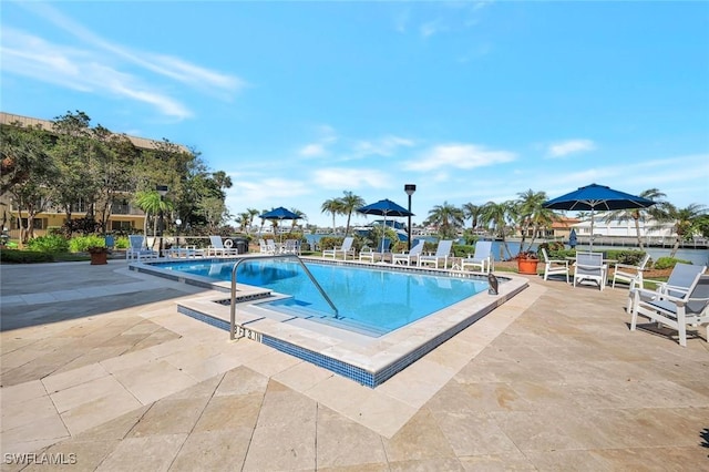 3100 Gulf Shore Blvd N Unit 103, Naples, FL 34103 - community pool featuring a patio