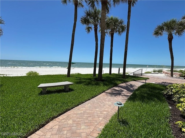 3100 Gulf Shore Blvd N Unit 103, Naples, FL 34103 - view of property's community with a yard and view of water and beach