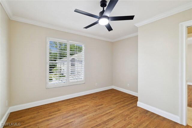 3770 Fieldstone Blvd Unit 1508, Naples, FL 34109 - spare room featuring light wood finished floors, ceiling fan, baseboards, and ornamental molding