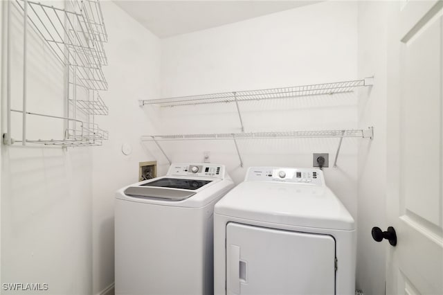 3770 Fieldstone Blvd Unit 1508, Naples, FL 34109 - washroom with laundry area and independent washer and dryer