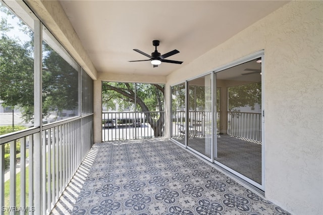 3770 Fieldstone Blvd Unit 1508, Naples, FL 34109 - unfurnished sunroom with a ceiling fan