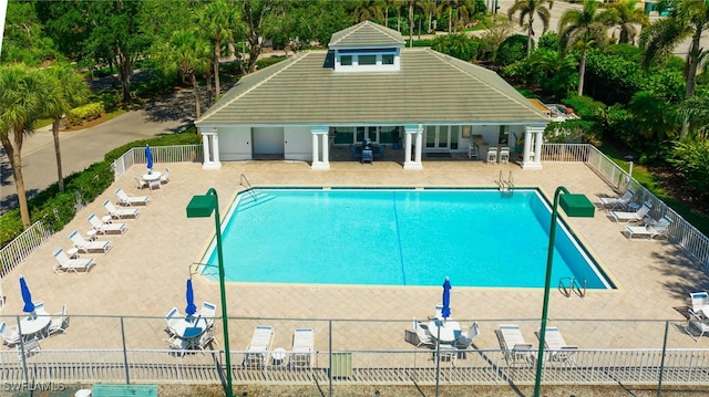 3770 Fieldstone Blvd Unit 1508, Naples, FL 34109 - community pool with a patio area and fence