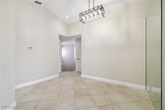 3770 Fieldstone Blvd Unit 1508, Naples, FL 34109 - empty room featuring baseboards, visible vents, high vaulted ceiling, and light tile patterned floors