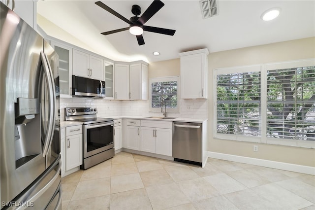 3770 Fieldstone Blvd Unit 1508, Naples, FL 34109 - kitchen featuring backsplash, visible vents, appliances with stainless steel finishes, and a sink