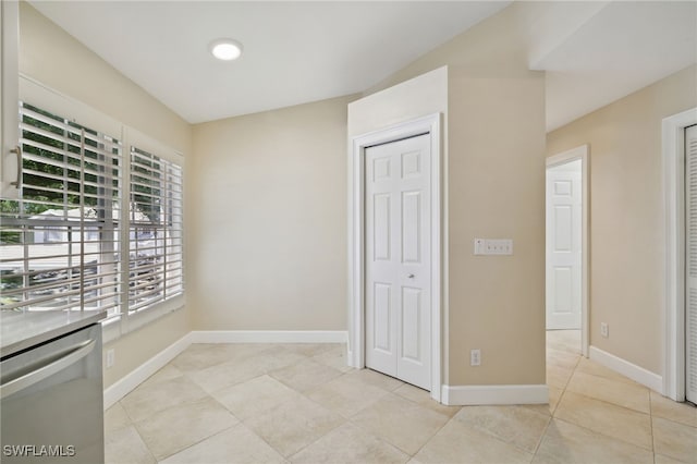 3770 Fieldstone Blvd Unit 1508, Naples, FL 34109 - spare room featuring baseboards and light tile patterned floors