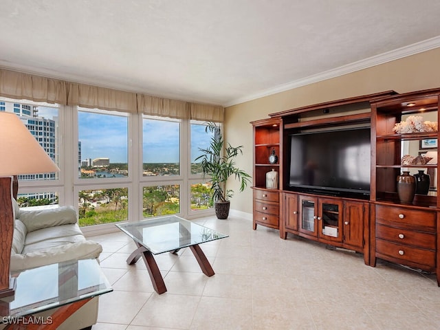 living room with baseboards, light tile patterned floors, and crown molding