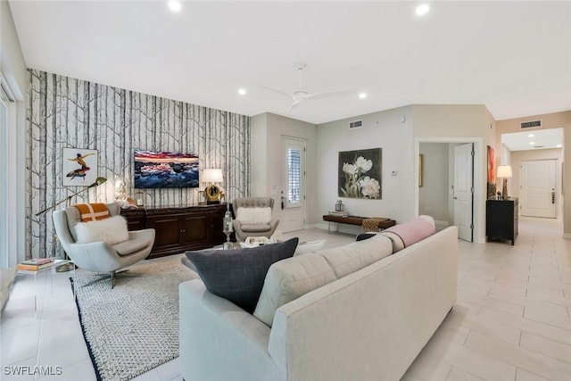 190 Indies Dr E Unit 102, Naples, FL 34114 - living area with wallpapered walls, an accent wall, visible vents, and recessed lighting
