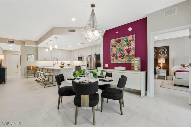 190 Indies Dr E Unit 102, Naples, FL 34114 - dining space featuring recessed lighting, a notable chandelier, and visible vents