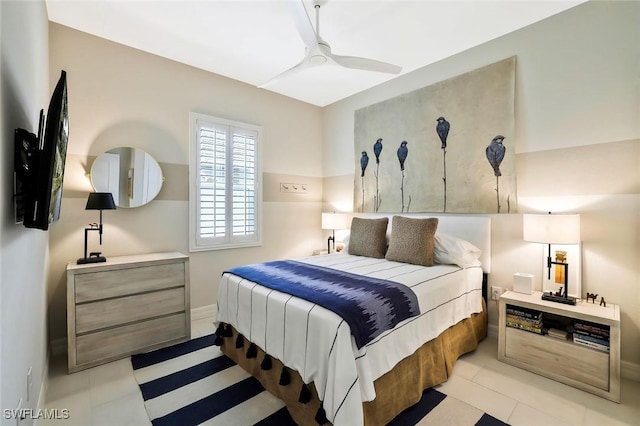 190 Indies Dr E Unit 102, Naples, FL 34114 - bedroom featuring light tile patterned floors, baseboards, and ceiling fan