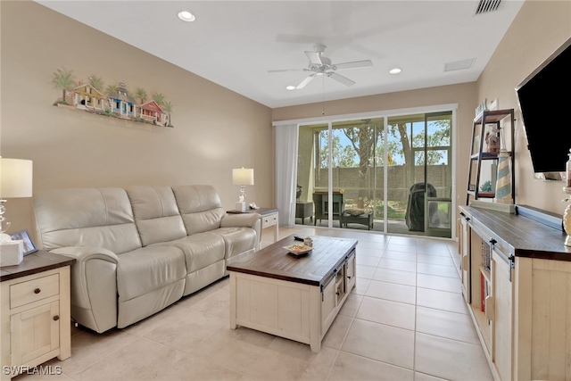 living area featuring ceiling fan, light tile patterned flooring, visible vents, and recessed lighting