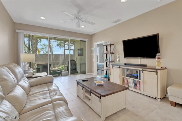 living area featuring visible vents, recessed lighting, ceiling fan, and light tile patterned flooring
