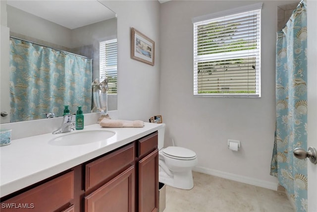 full bath with baseboards, toilet, and vanity