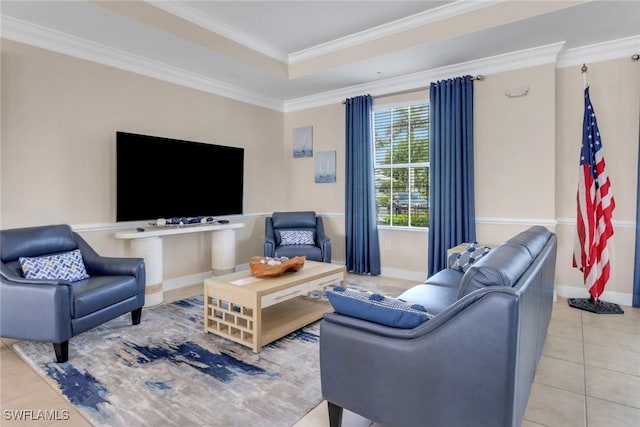 tiled living area featuring baseboards and ornamental molding