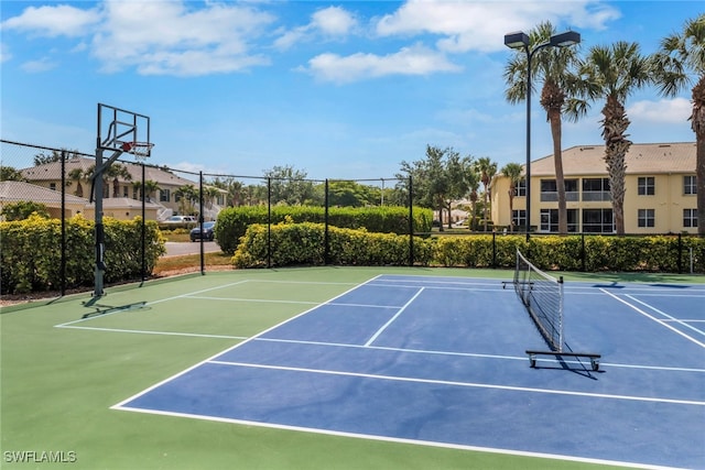view of sport court with community basketball court and fence