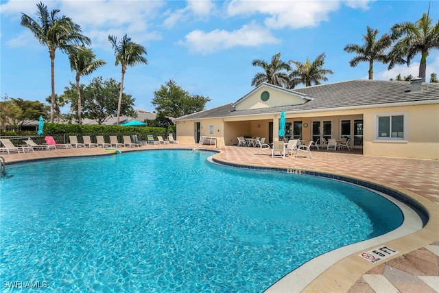 pool featuring a patio area