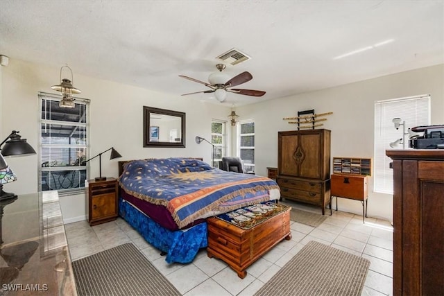 813 105th Ave N, Naples, FL 34108 - bedroom featuring light tile patterned flooring, multiple windows, and ceiling fan