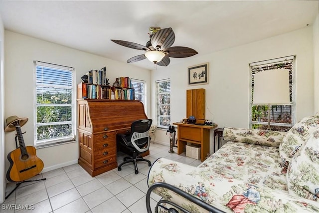 813 105th Ave N, Naples, FL 34108 - bedroom with light tile patterned flooring and a ceiling fan