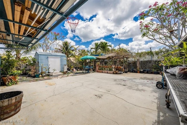 813 105th Ave N, Naples, FL 34108 - view of patio / terrace with a shed