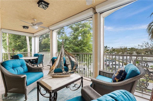 14356 Harbour Landings Dr Unit 6C, Fort Myers, FL 33908 - sunroom / solarium with ceiling fan and outdoor dining area