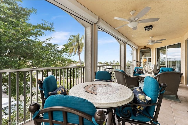 14356 Harbour Landings Dr Unit 6C, Fort Myers, FL 33908 - sunroom featuring ceiling fan, an outdoor hangout area, and plenty of natural light