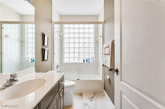 14356 Harbour Landings Dr Unit 6C, Fort Myers, FL 33908 - full bathroom featuring toilet, vanity, enclosed tub / shower combo, and healthy amount of natural light