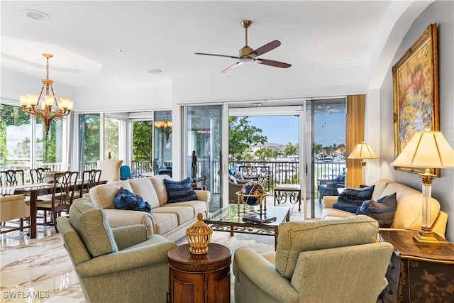 14356 Harbour Landings Dr Unit 6C, Fort Myers, FL 33908 - living room featuring a chandelier, healthy amount of natural light, ceiling fan, and marble tiled floors