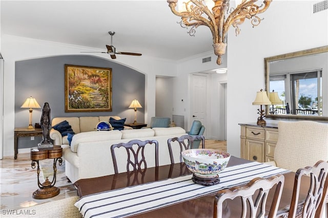 14356 Harbour Landings Dr Unit 6C, Fort Myers, FL 33908 - dining room featuring a ceiling fan, crown molding, and a chandelier