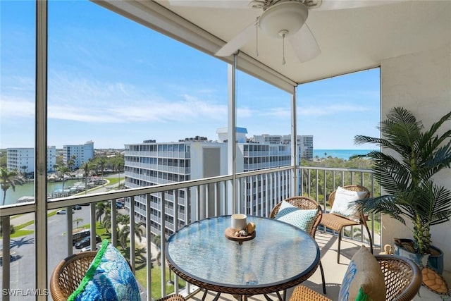 5 Bluebill Ave Unit 812, Naples, FL 34108 - balcony featuring a water view, ceiling fan, and a view of city