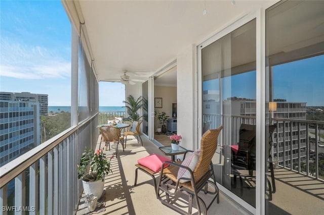 5 Bluebill Ave Unit 812, Naples, FL 34108 - balcony featuring a ceiling fan and a water view