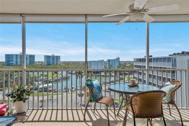 5 Bluebill Ave Unit 812, Naples, FL 34108 - sunroom / solarium with a water view, a city view, and a wealth of natural light