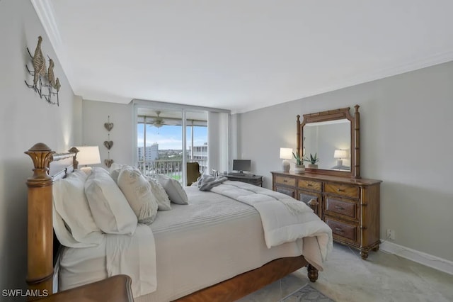 5 Bluebill Ave Unit 812, Naples, FL 34108 - bedroom with access to outside and baseboards