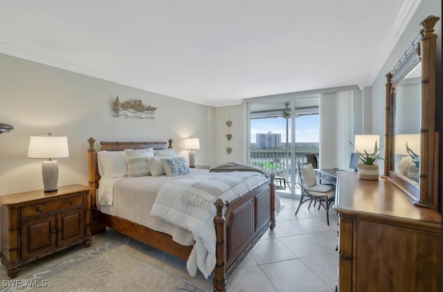 5 Bluebill Ave Unit 812, Naples, FL 34108 - bedroom featuring light tile patterned floors and access to exterior