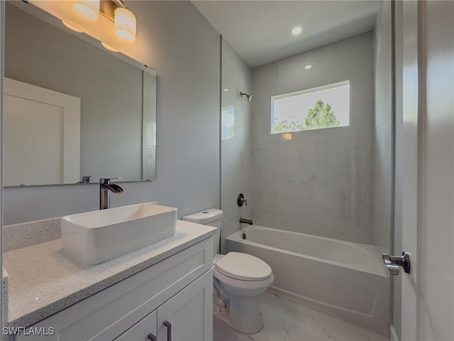 full bathroom featuring toilet, shower / tub combination, marble finish floor, and vanity