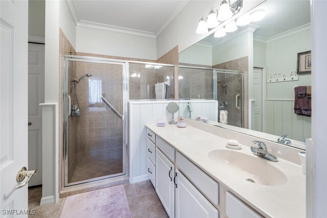 14194 Fall Creek Ct, Naples, FL 34114 - full bath with crown molding, a stall shower, vanity, and tile patterned floors