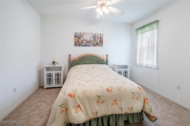 14194 Fall Creek Ct, Naples, FL 34114 - tiled bedroom featuring baseboards and a ceiling fan